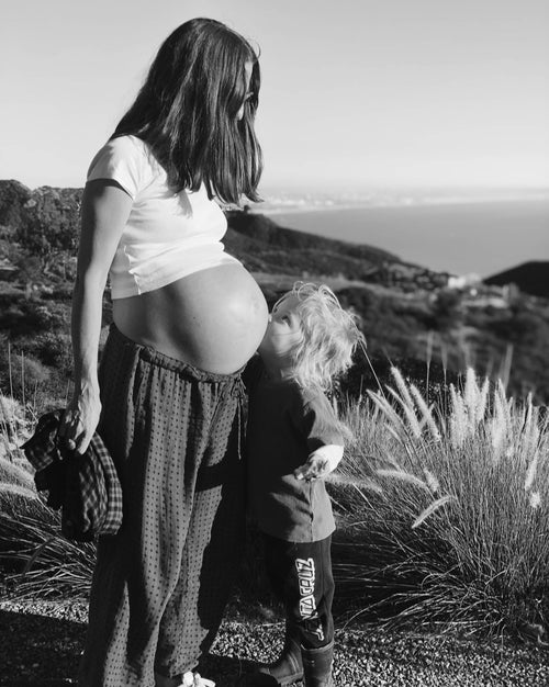 Pregnant woman with child